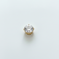 Gold solitaire pendant with white zirconia - white background