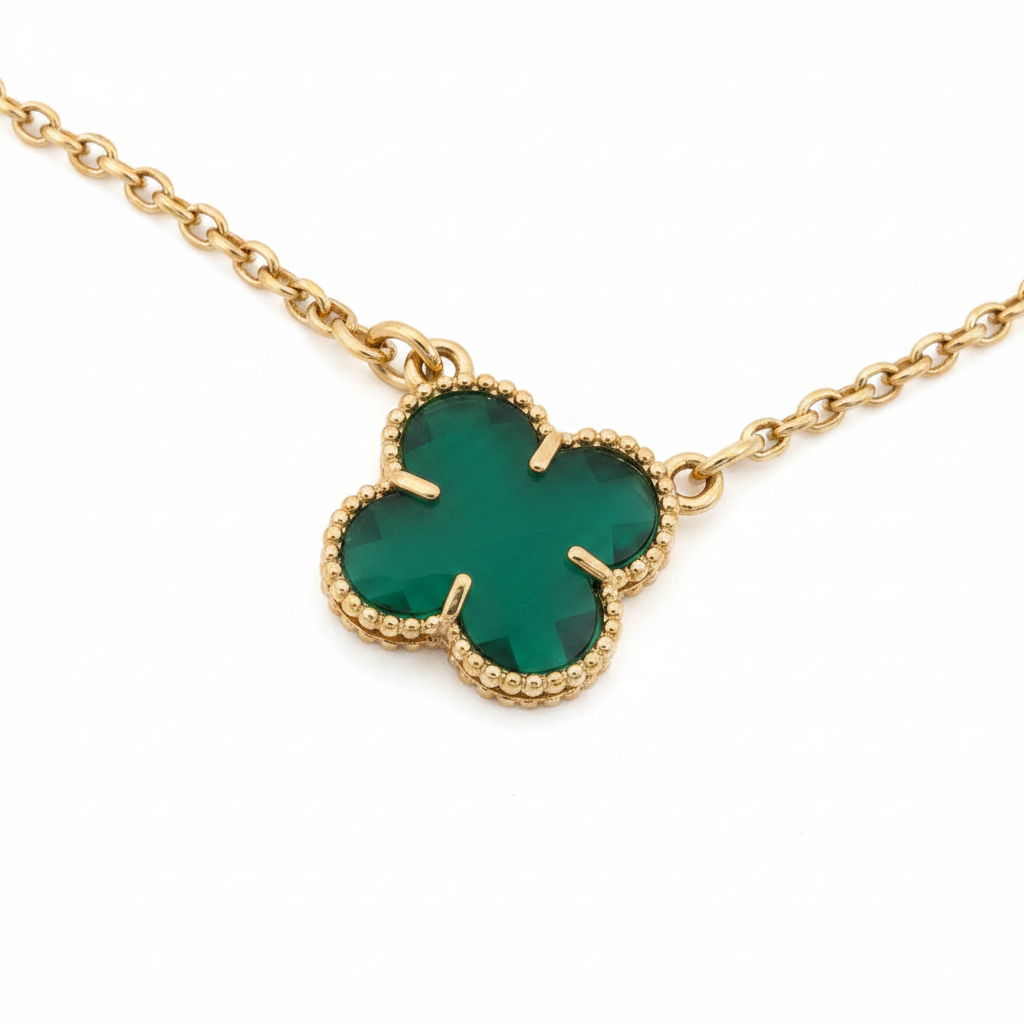 Close-up green clover pendant and gold Portuguese link chain - ROSE GLAM & GLOW Boutique