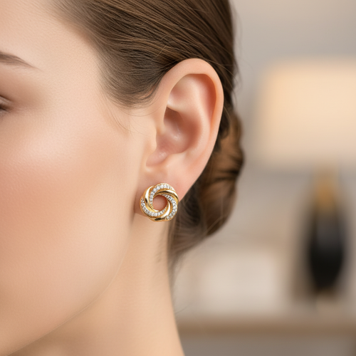 Close-up of 18K Gold Plated Round Zirconia Stud Earring on model