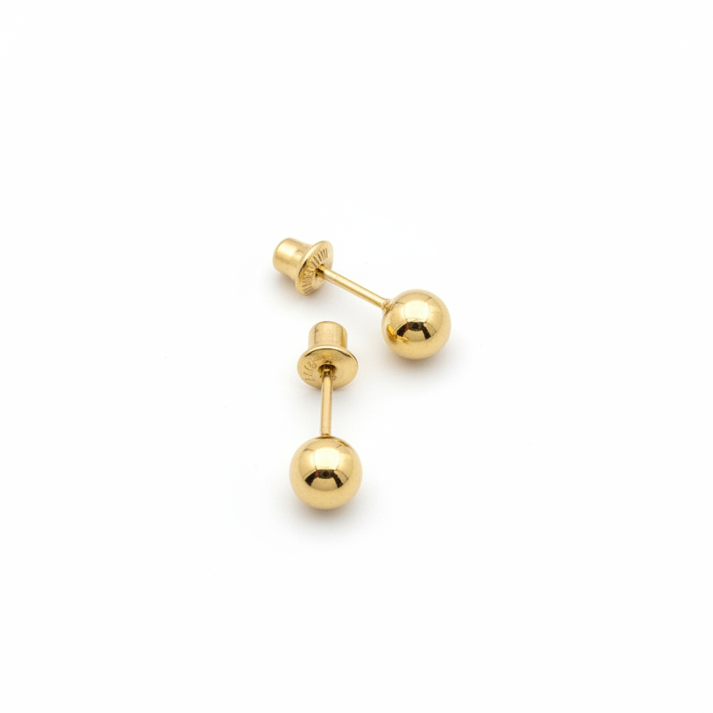 Gold ball stud earrings on white professional background